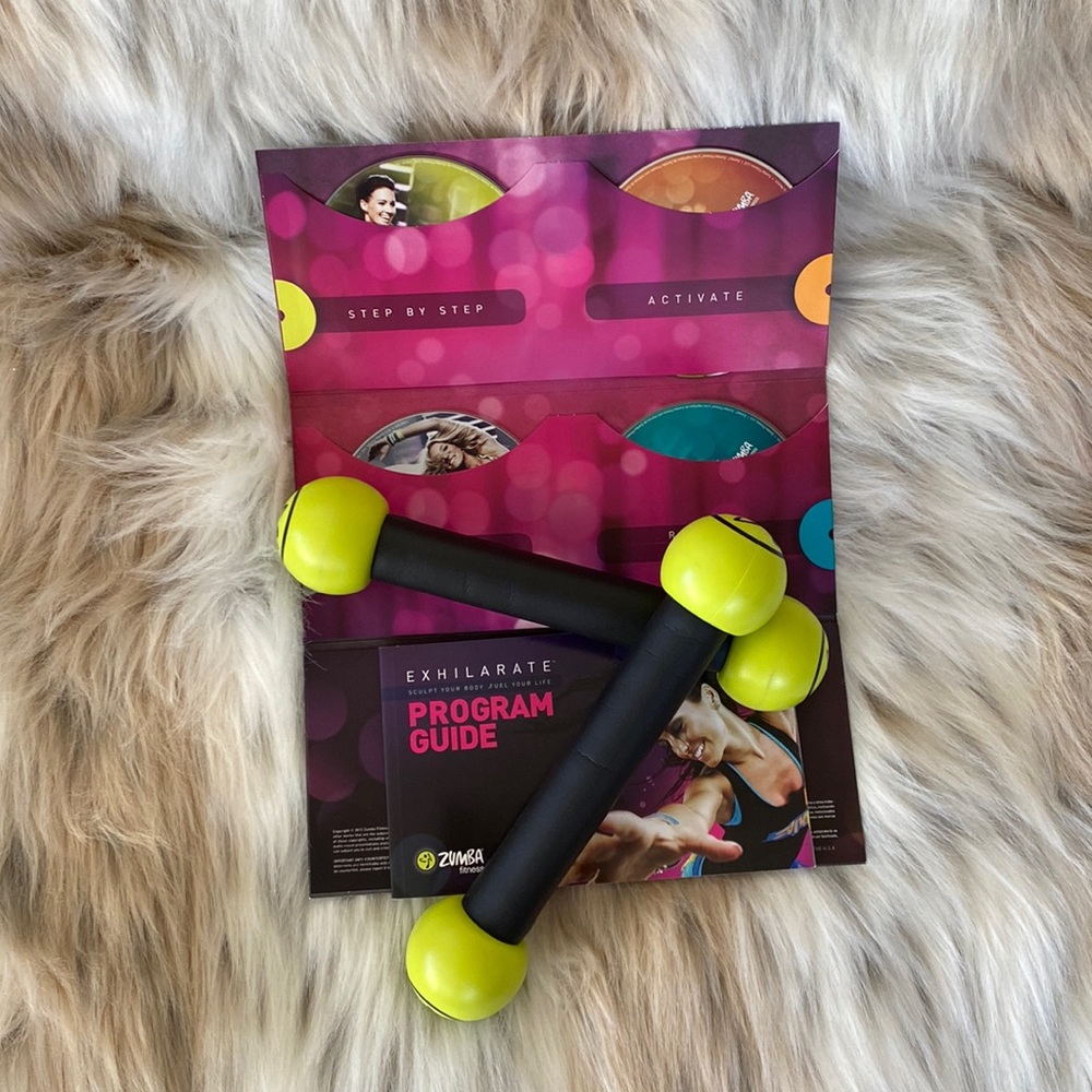 Zumba Fitness Exhilarate kit with toning sticks and DVDs